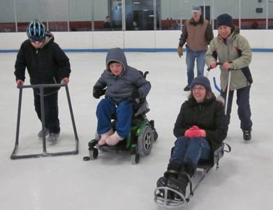 3 children using adapted skating methods